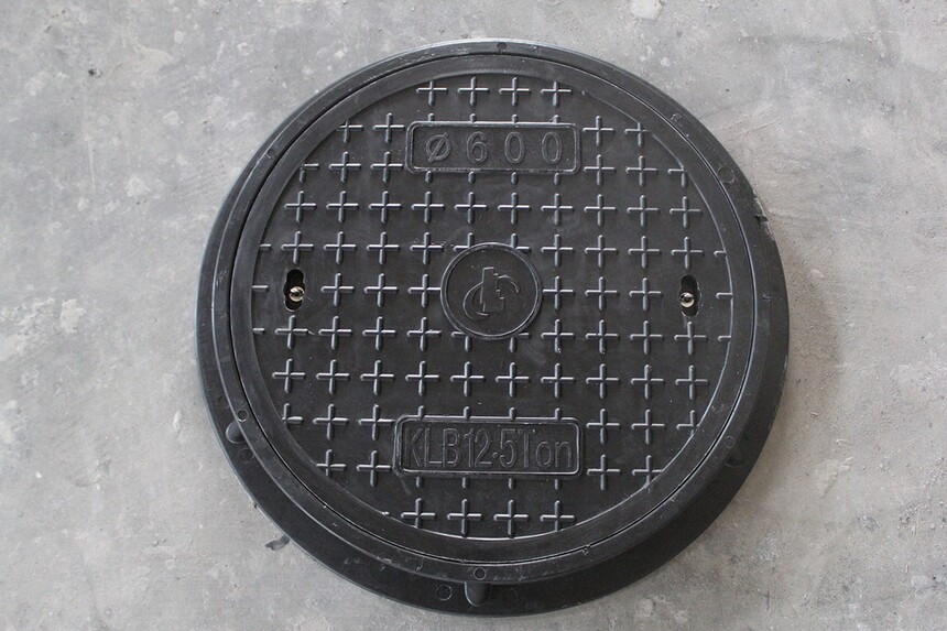 球墨铸铁防盗井盖表面处理一般采用什么工艺